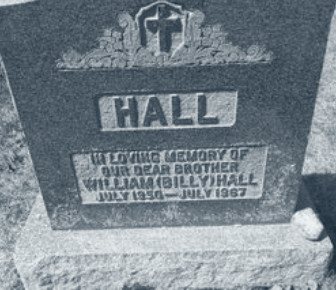 Grey granite stone reading: Hall. In loving memory of our dear brother, William (Billy) Hall, July 1950 to July 1967